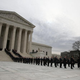 Law clerks past and present line the steps as the casket of Associate Justice Antonin Scalia is carried by U.S. Supreme Court police officers up the steps of the Supreme Court Building in Washington, D.C., Feb. 19, 2016.
Mark Wilson/Getty Images